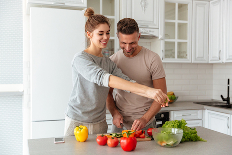 couple cooking healthy food