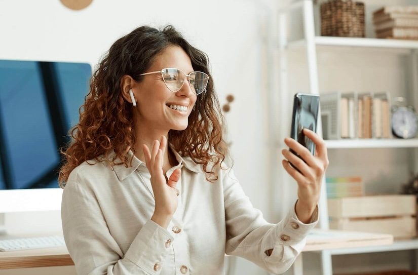 happy woman on virtual meeting